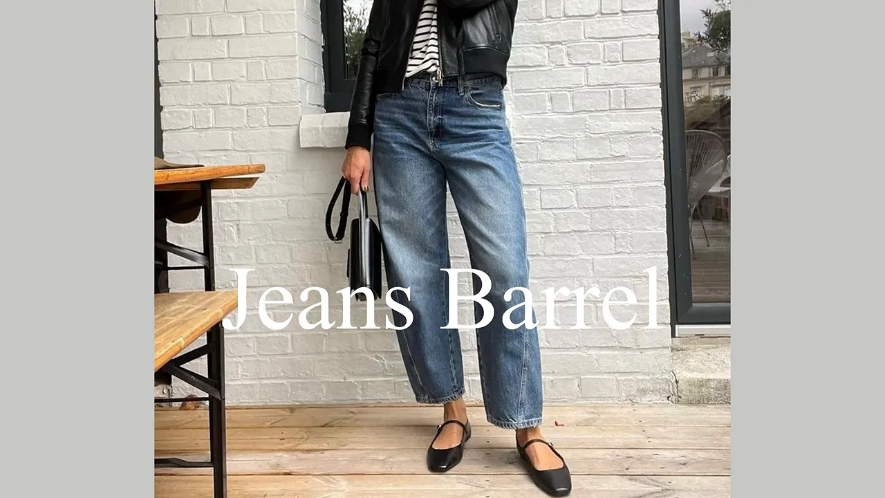 Outfit showing curved blue jeans with a black jacket, striped top, and black flats